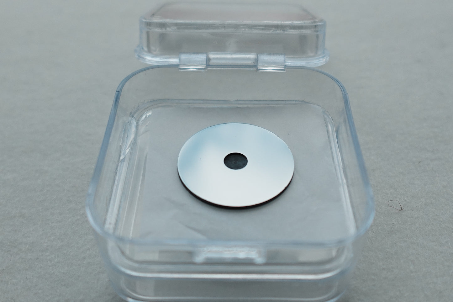 Custom size low background sample holder in open packaging